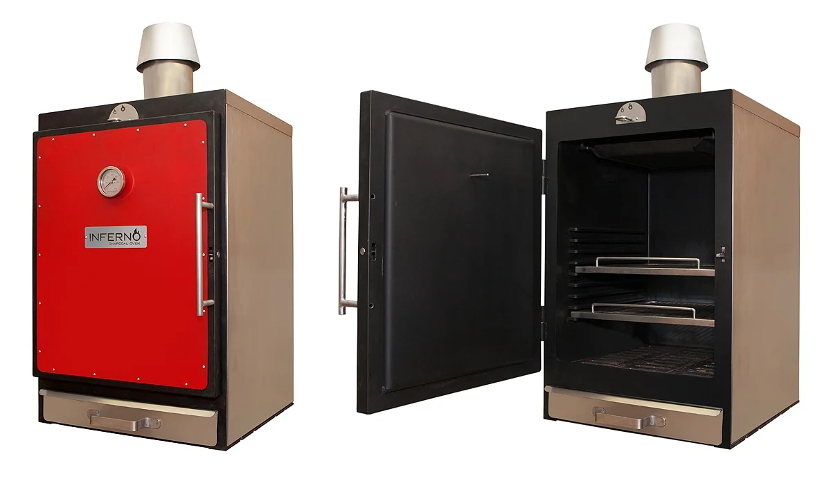 Two views of the first INFERNO ALTO, made and sold in June 2020, with timber side panels and a conical cowl on its flue: closed, with a red door carrying a thermometer, the INFERNO CHARCOAL OVEN badge and a stainless handle; and open, showing the black inside of the door and two grids in the chamber.