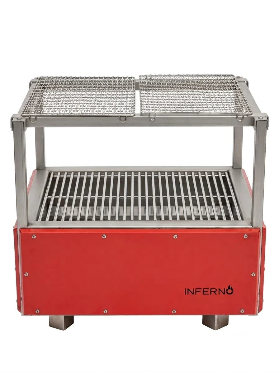 The Robatayaki from the front in a red finish: a rod grid over the fire box, a mesh grid raised above it on a stainless frame, and an Inferno logo on the red front panel, on short stainless feet.