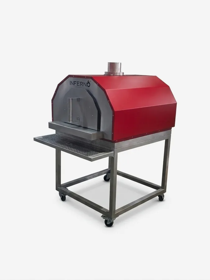 The Inferno X Pizza Oven, a domed wood-fired oven on a stand.